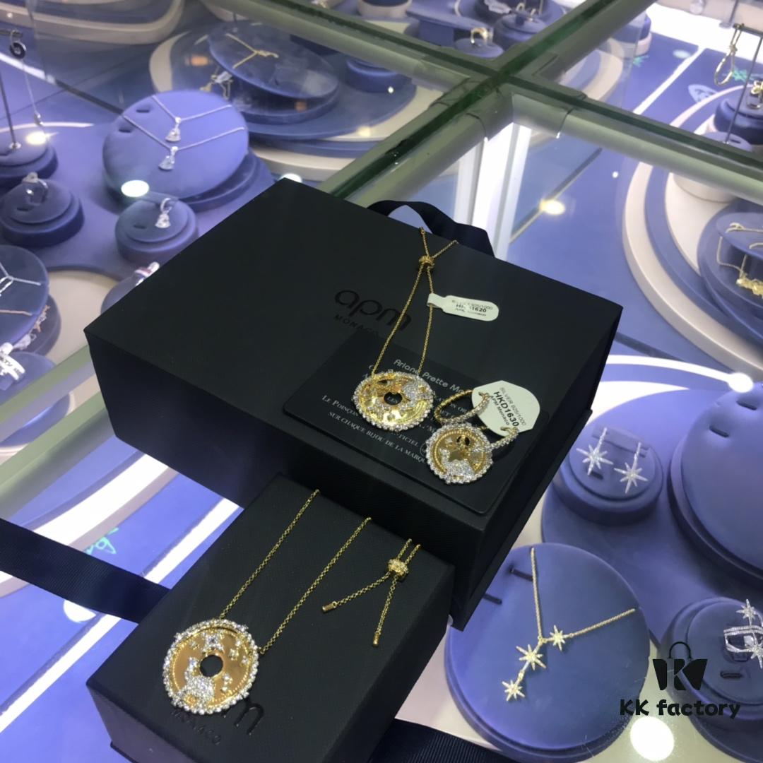 A Monaco Camel Round Pendant Necklace, Bracelet, Ring, and Earrings