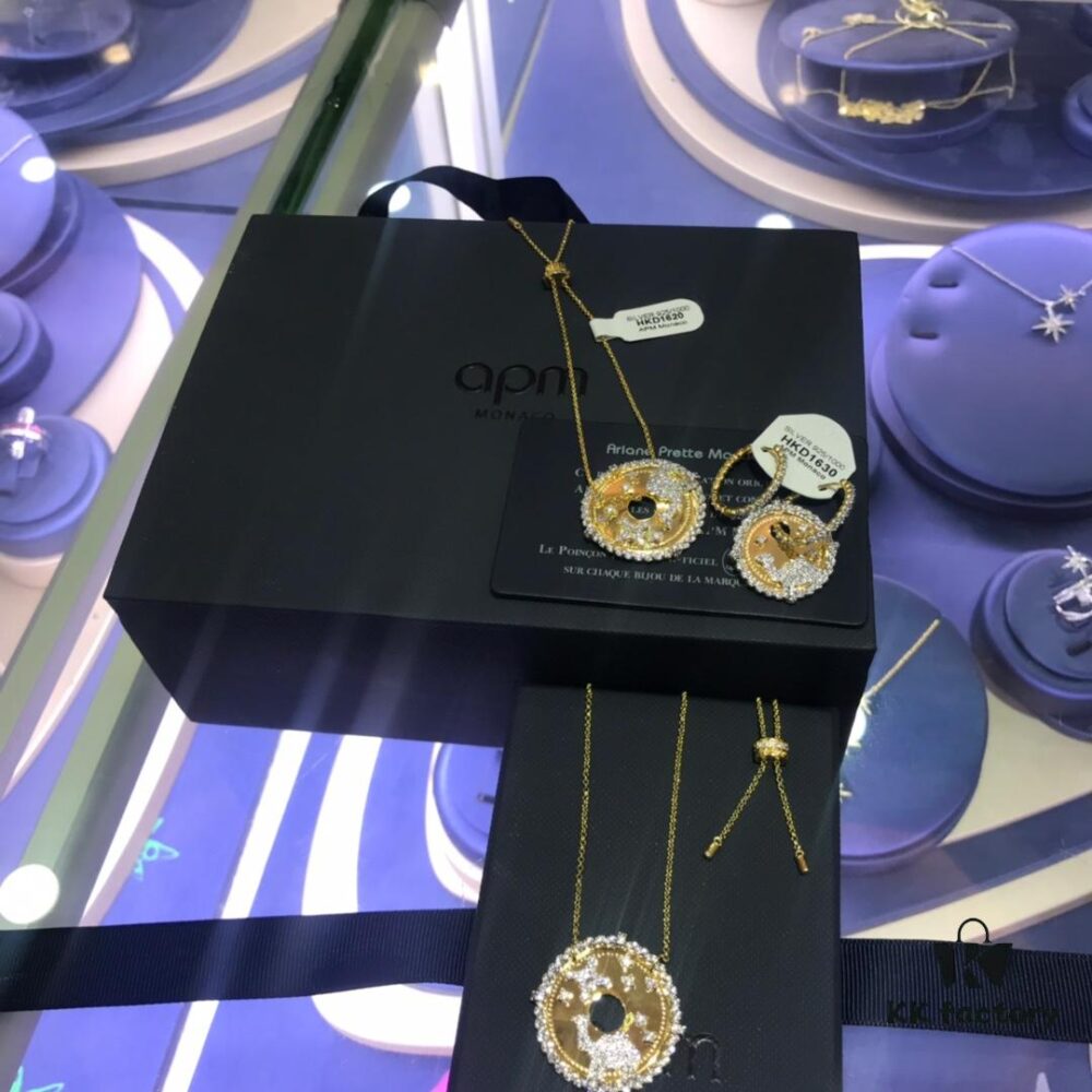 A Monaco Camel Round Pendant Necklace, Bracelet, Ring, and Earrings