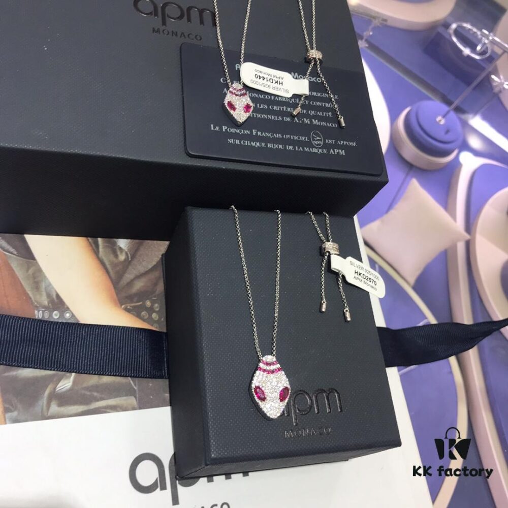 A Family Monaco Red Eye Large and Small Snake Head Necklace