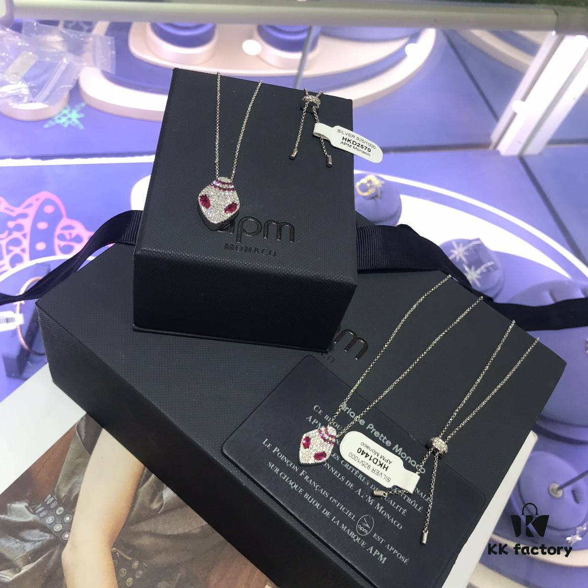 A Family Monaco Red Eye Large and Small Snake Head Necklace