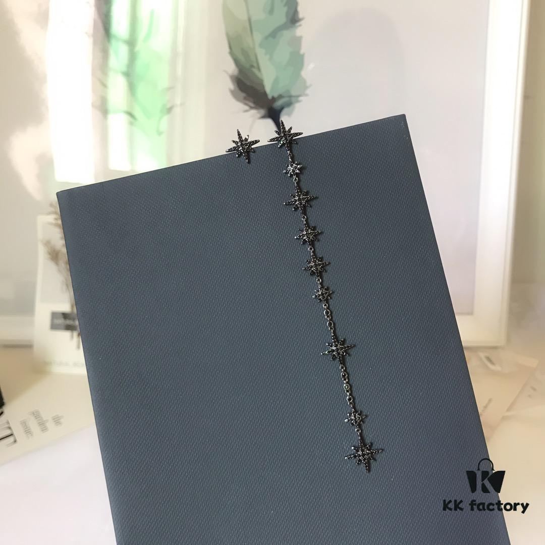 APM Monaco Asymmetric Long Shooting Star Earrings, Stylish and Minimalist Design for Women