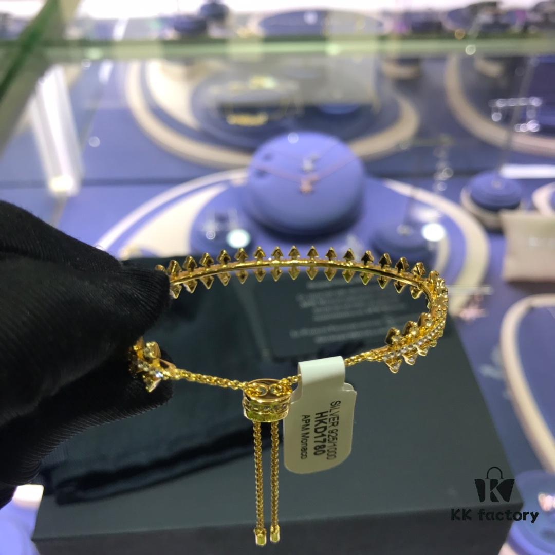 APM Monaco Gold-Tone Gear Bracelet Adjustable Length Women's Fashion Bracelet