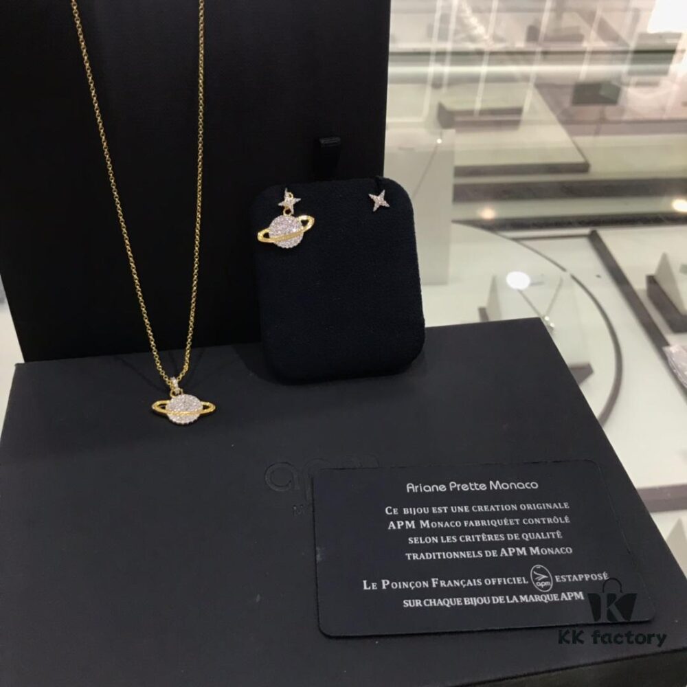 APM Monaco Cosmic Collection Saturn Planet Gold-Tone Stud Earrings and Necklace with Rhinestones, Stylish and Versatile