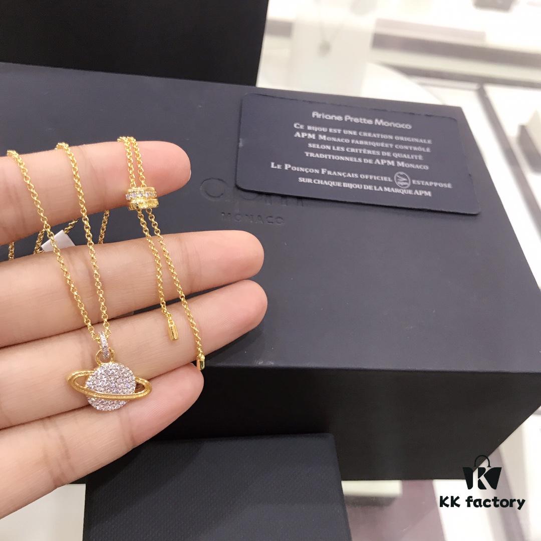 APM Monaco Cosmic Collection Saturn Planet Gold-Tone Stud Earrings and Necklace with Rhinestones, Stylish and Versatile