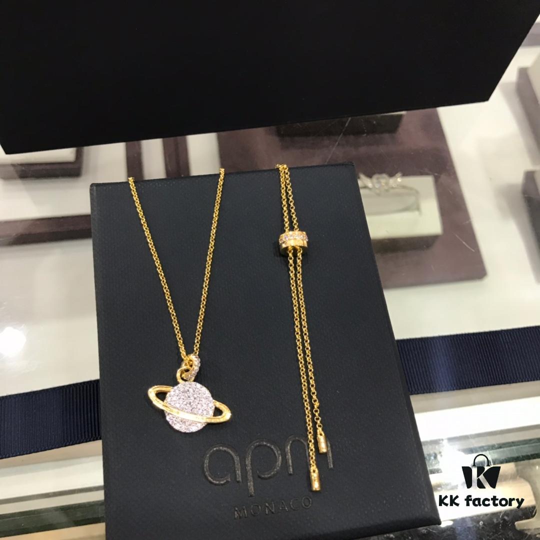 APM Monaco Cosmic Collection Saturn Planet Gold-Tone Stud Earrings and Necklace with Rhinestones, Stylish and Versatile