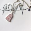 Gucci Ghost Pink Enamel Pendant, Comes with Accessory Box and Dust Bag, Includes 925 Silver Chain, Reversible Design, Excellent Condition, Rare Color from Official Stores, Logo Features the Ghost's Eyes, Soft Pink Tone, Subtle Without Oversized G Logo, Stylish and Versatile Design