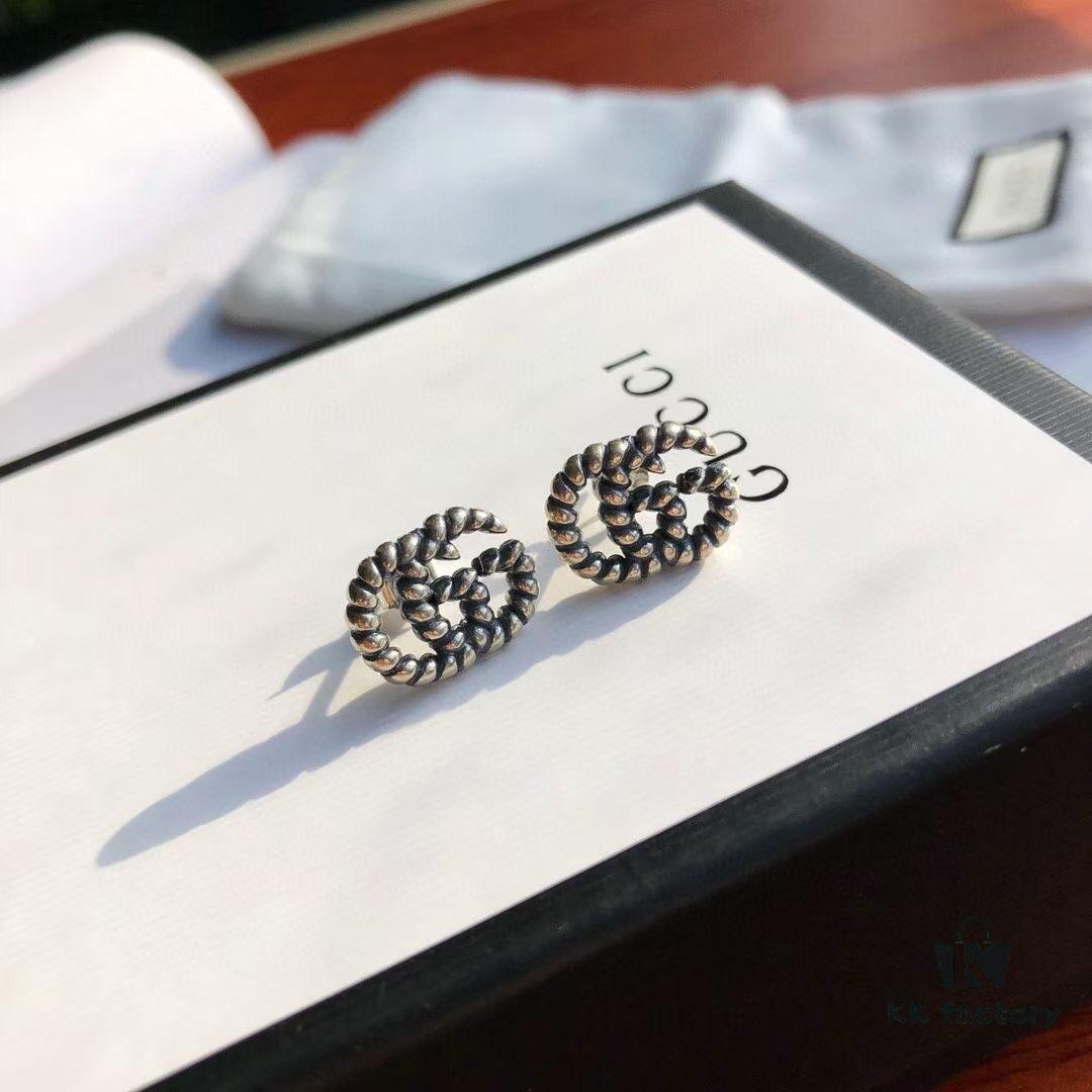 New Arrival Sterling Silver Stud Earrings Featuring Interlocking GG Motif on Twisted Ribbon Design