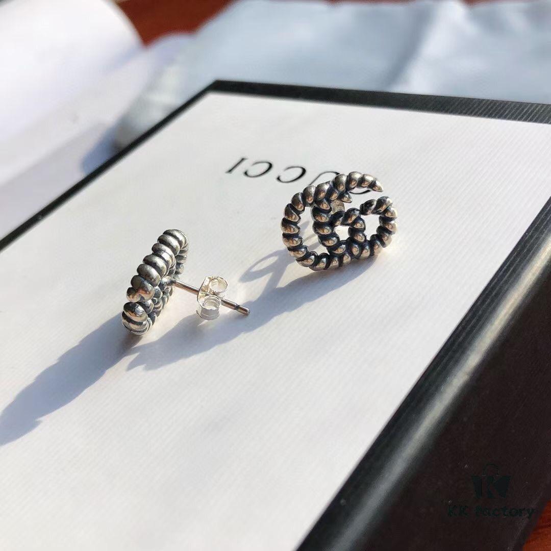 New Arrival Sterling Silver Stud Earrings Featuring Interlocking GG Motif on Twisted Ribbon Design