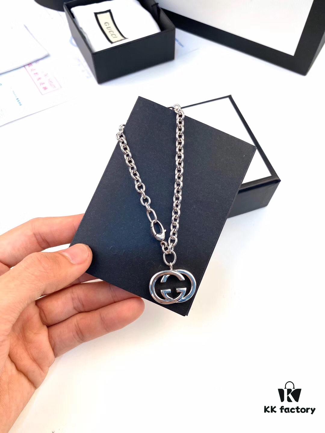 Gucci Bracelet with Interlocking Double G Pendant, Iconic Symbol of the Spirit, Crafted in Sterling Silver