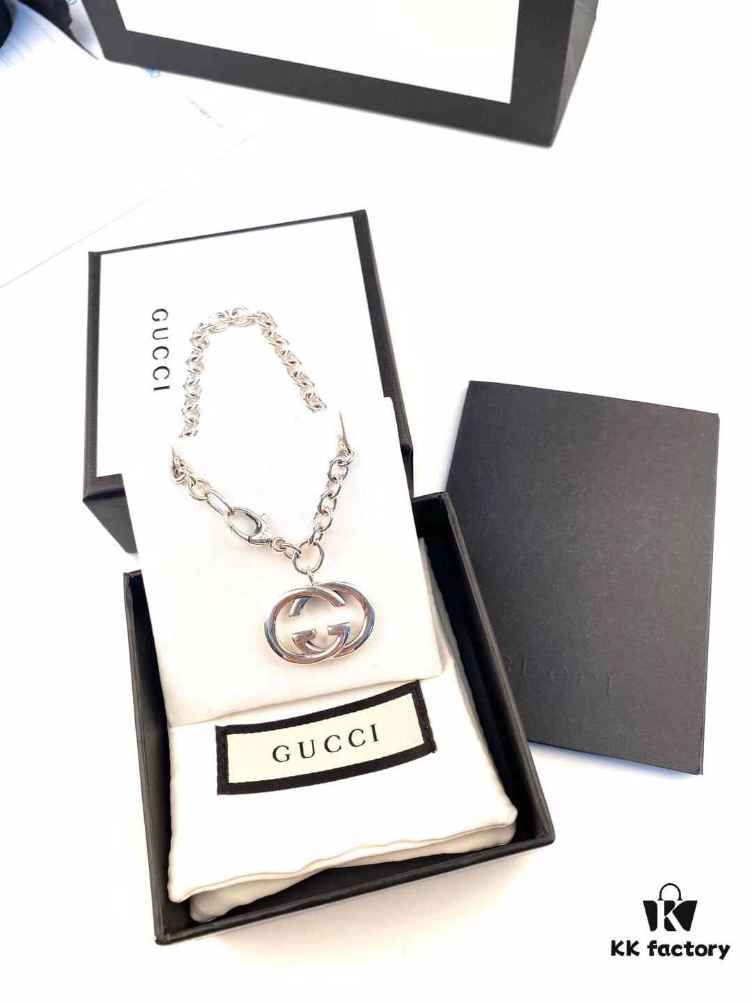 Gucci Bracelet with Interlocking Double G Pendant, Iconic Symbol of the Spirit, Crafted in Sterling Silver