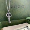 Winter Essential — Gucci Key Necklace, Silver Pendant for Sweaters