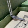 Winter Essential — Gucci Key Necklace, Silver Pendant for Sweaters