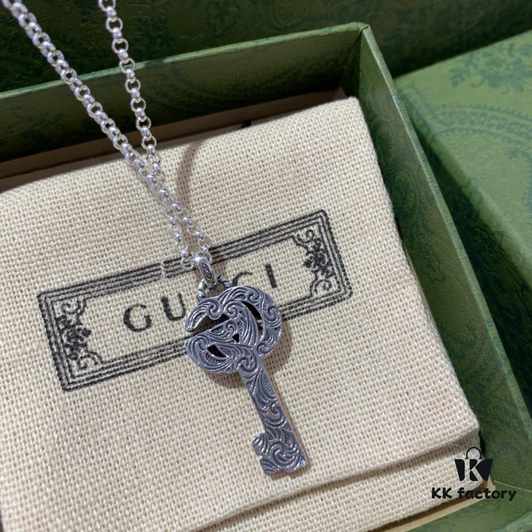 Winter Essential — Gucci Key Necklace, Silver Pendant for Sweaters