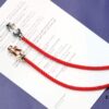 FRED Smooth U-Shaped Horsehoof Clasp Red Rope Bracelet