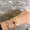 Fred - Red Bracelet with Horseshoe Clasp - Wearing Reference