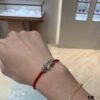 Fred - Red Horsehoof Knot Bracelet Wearing Reference