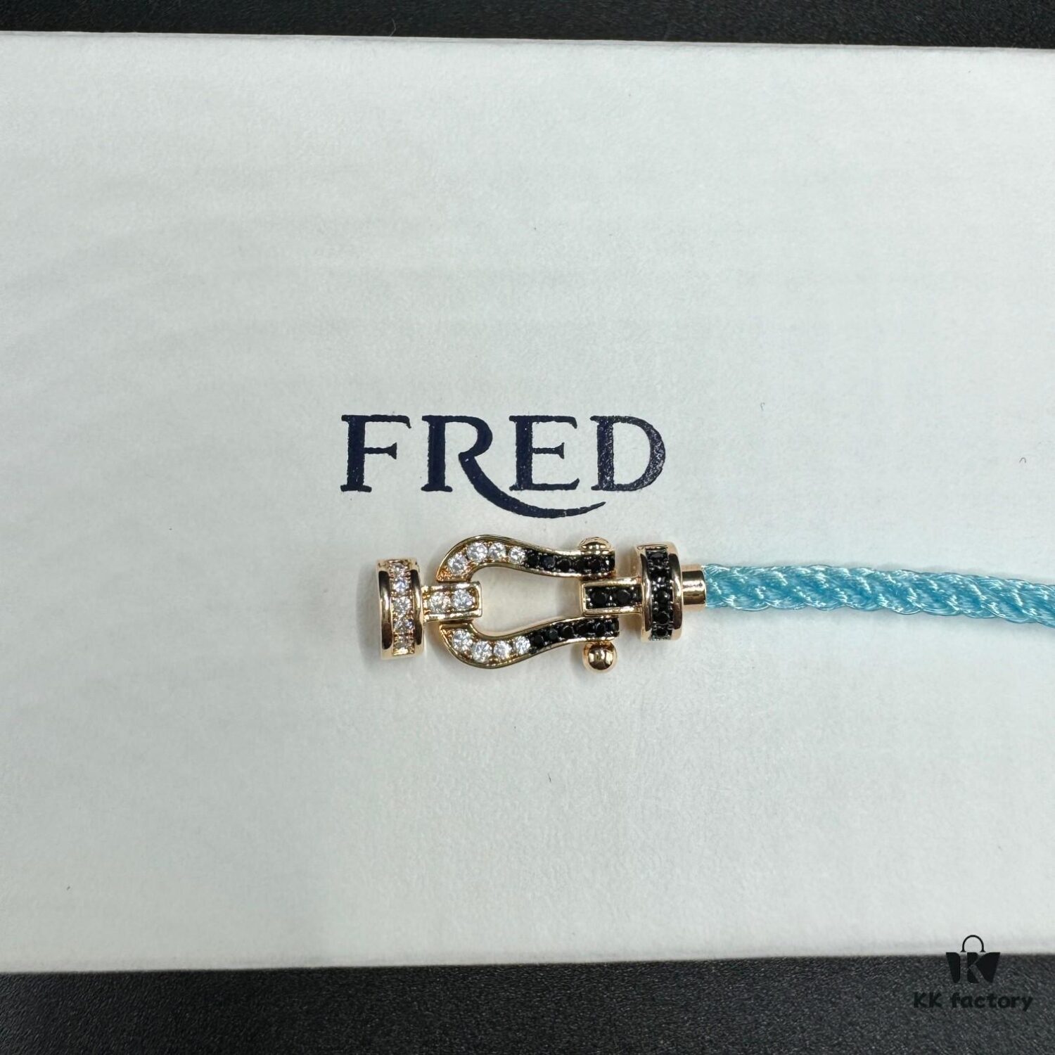 FRED Force 10 Bracelet in Rose Gold, Medium Size, with Black and White Gemstones, Steel Cord Design