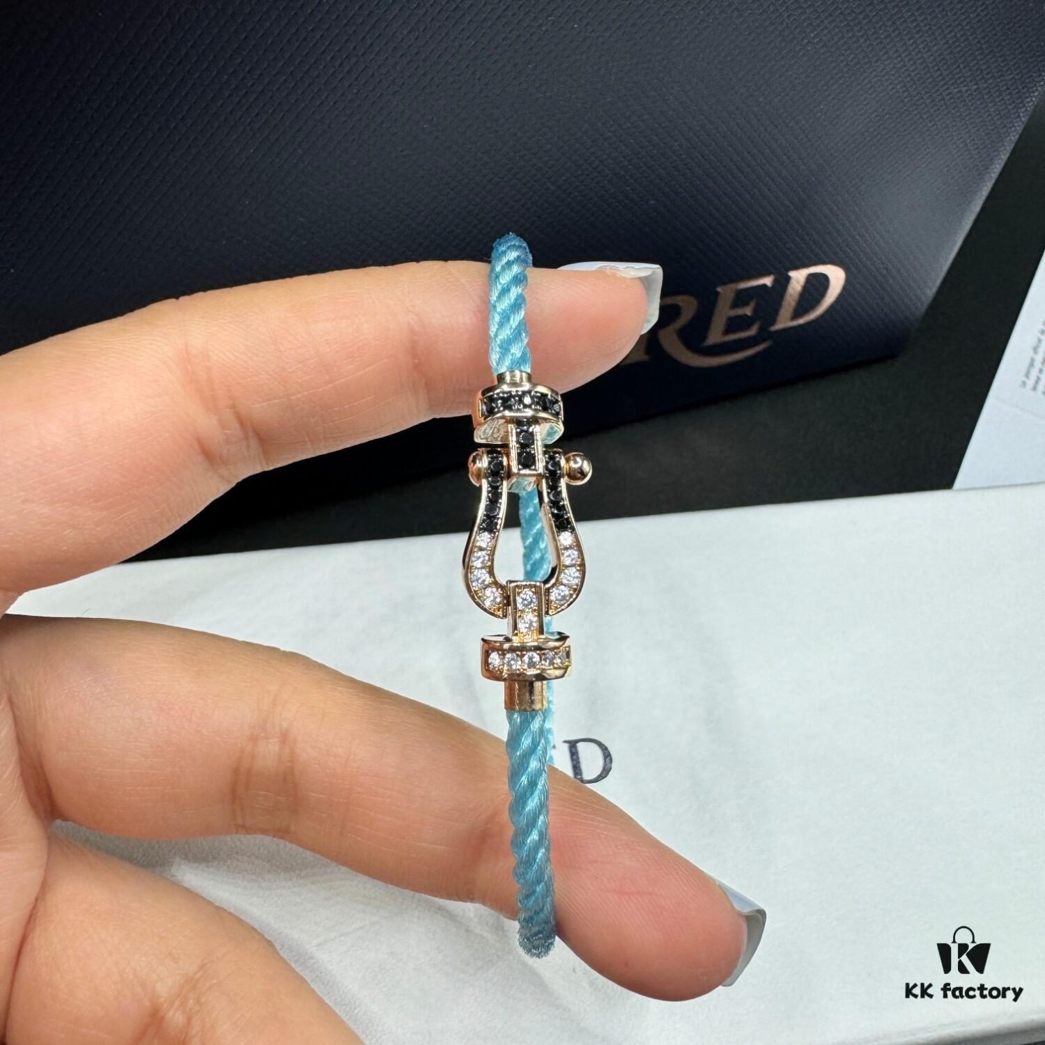 FRED Force 10 Bracelet in Rose Gold, Medium Size, with Black and White Gemstones, Steel Cord Design