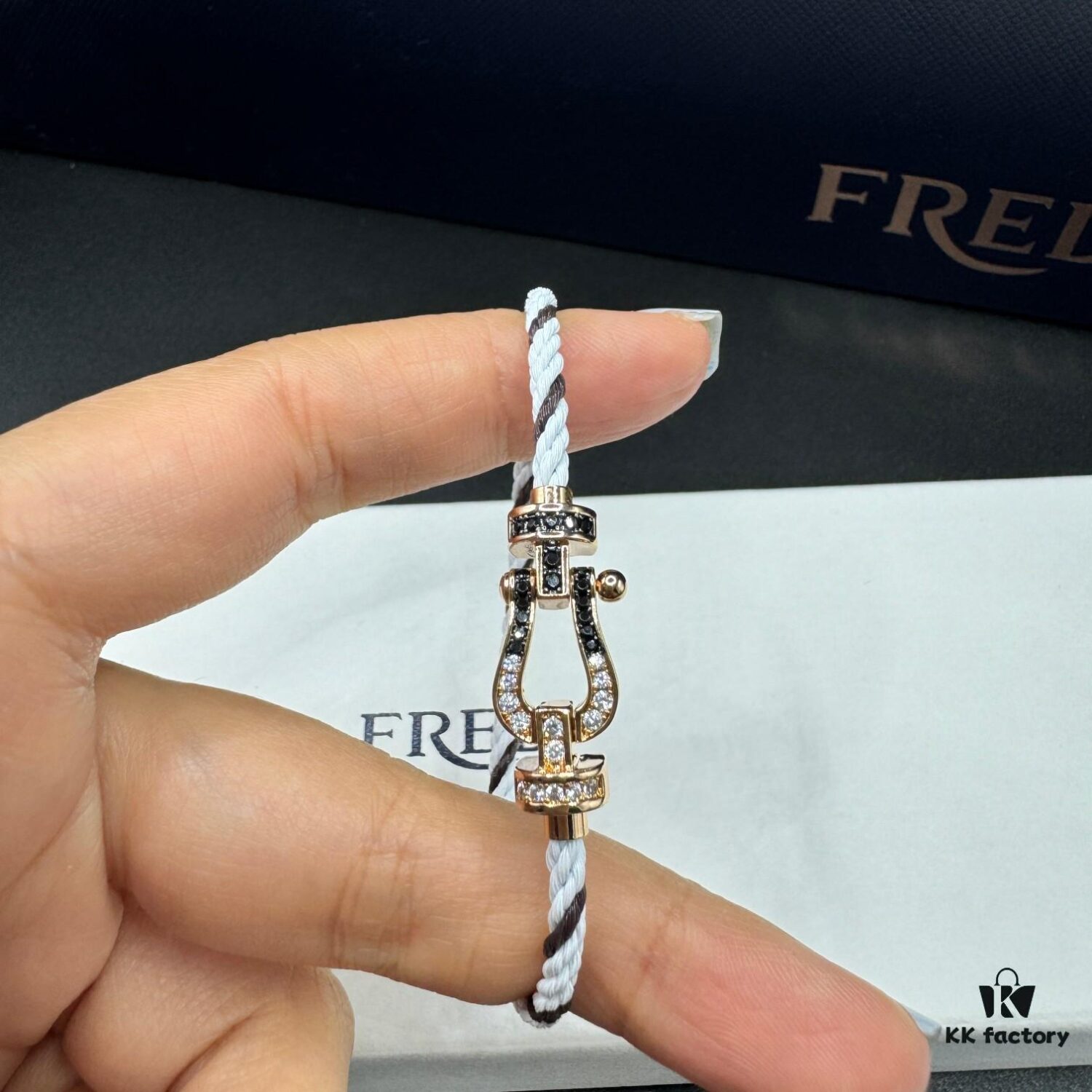 FRED Force 10 Bracelet in Rose Gold, Medium Size with Black and White Gemstones, Steel Cord Design