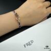 FRED Force 10 Bracelet in Rose Gold, Medium Size with Black and White Gemstones, Steel Cord Design