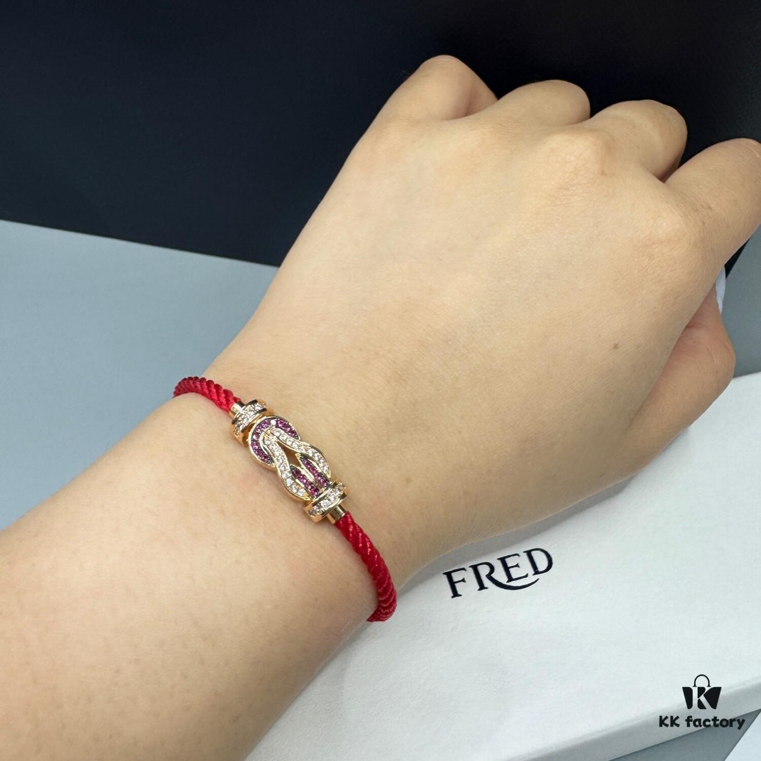 FRED Force 10 Bracelet in Rose Gold with Ruby, Medium Size, Red Sapphire Model, Steel Cord Design