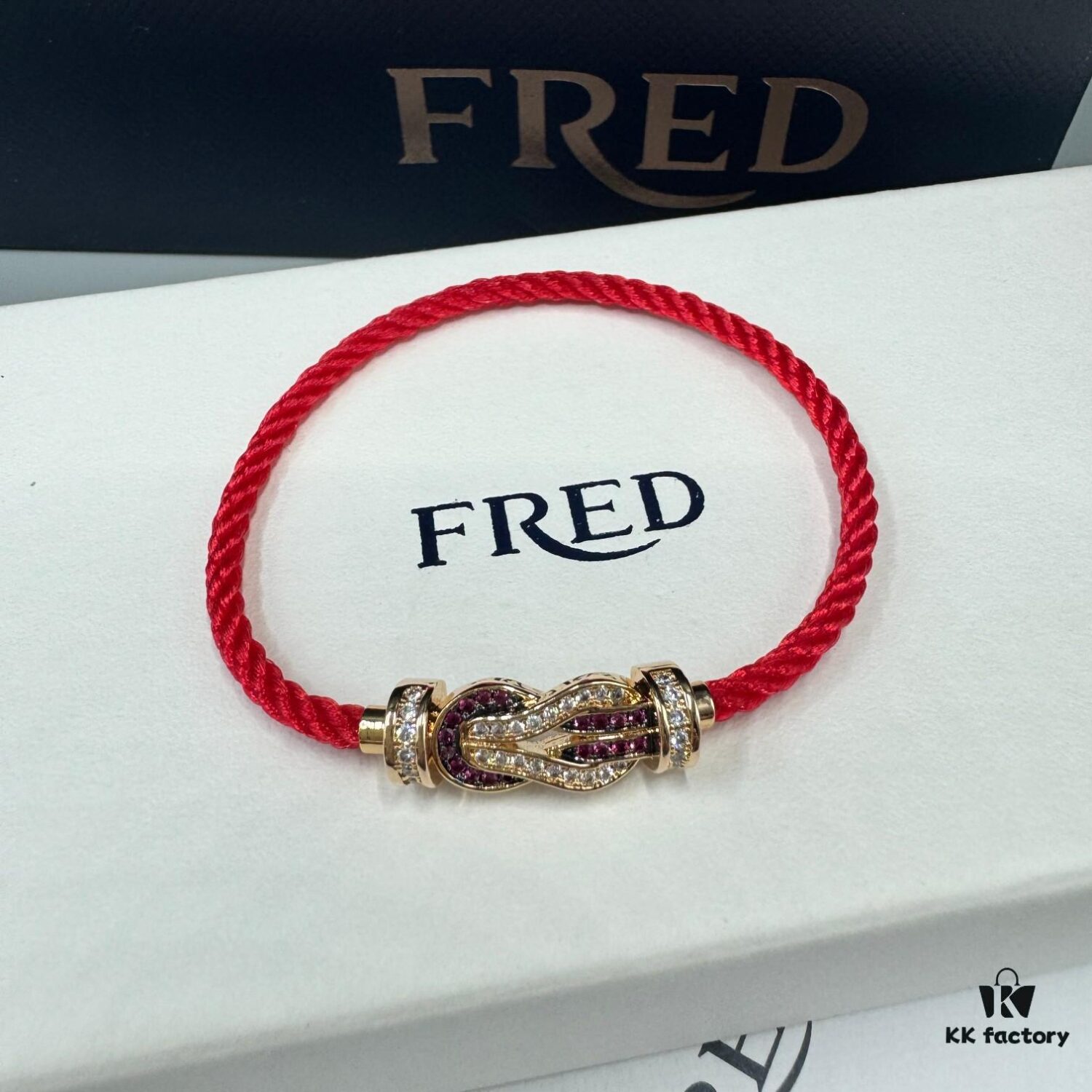 FRED Force 10 Bracelet in Rose Gold with Ruby, Medium Size, Red Sapphire Model, Steel Cord Design