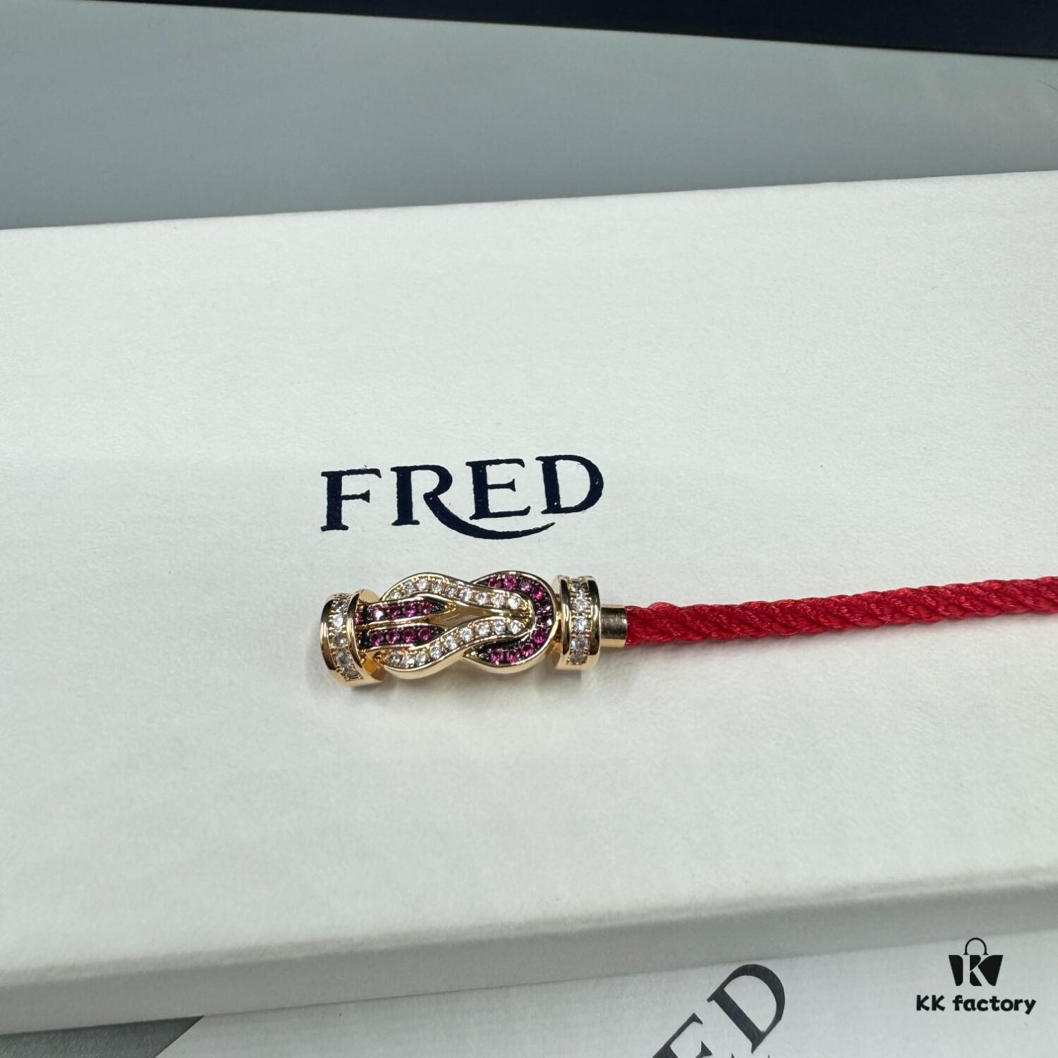 FRED Force 10 Bracelet in Rose Gold with Ruby, Medium Size, Red Sapphire Model, Steel Cord Design