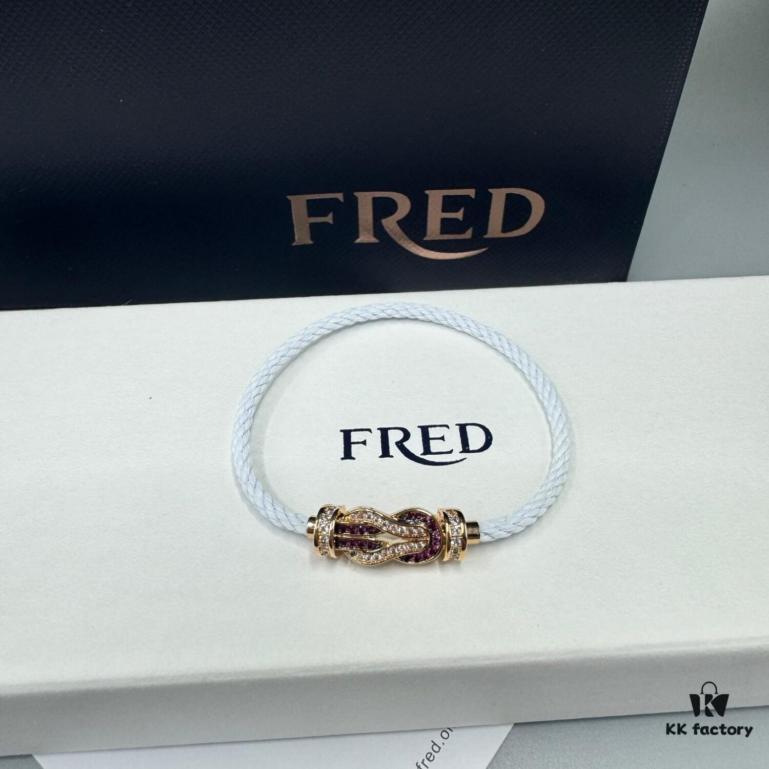 FRED Force 10 Bracelet in Rose Gold with Ruby, Medium Size, Stainless Steel Cord