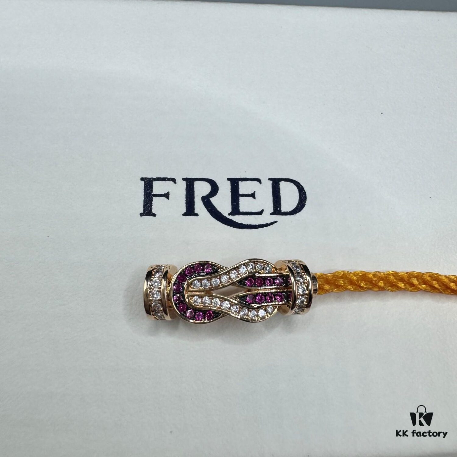 FRED Force 10 Bracelet in Rose Gold, Medium Size with Ruby Cabochon and Stainless Steel Cord