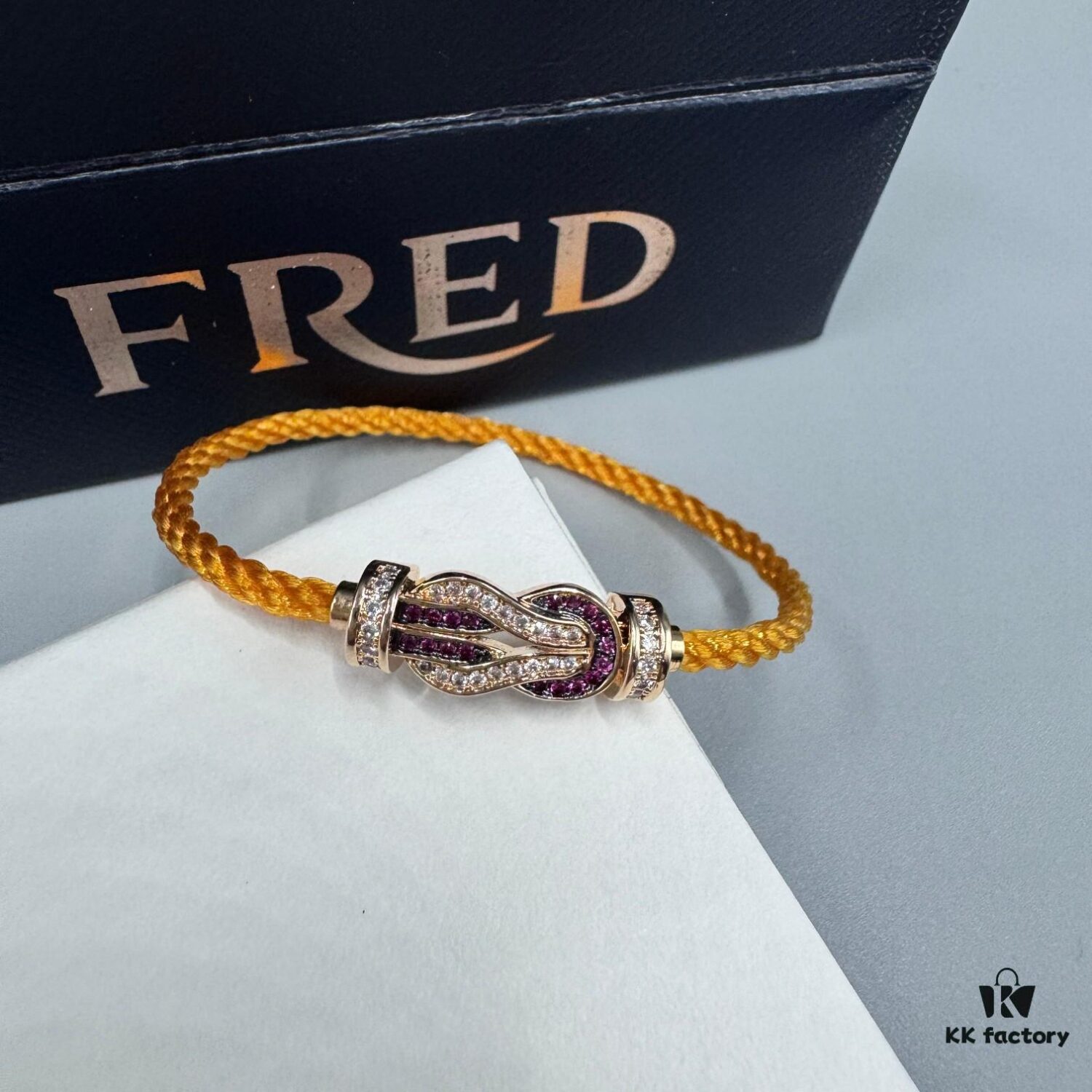 FRED Force 10 Bracelet in Rose Gold, Medium Size with Ruby Cabochon and Stainless Steel Cord