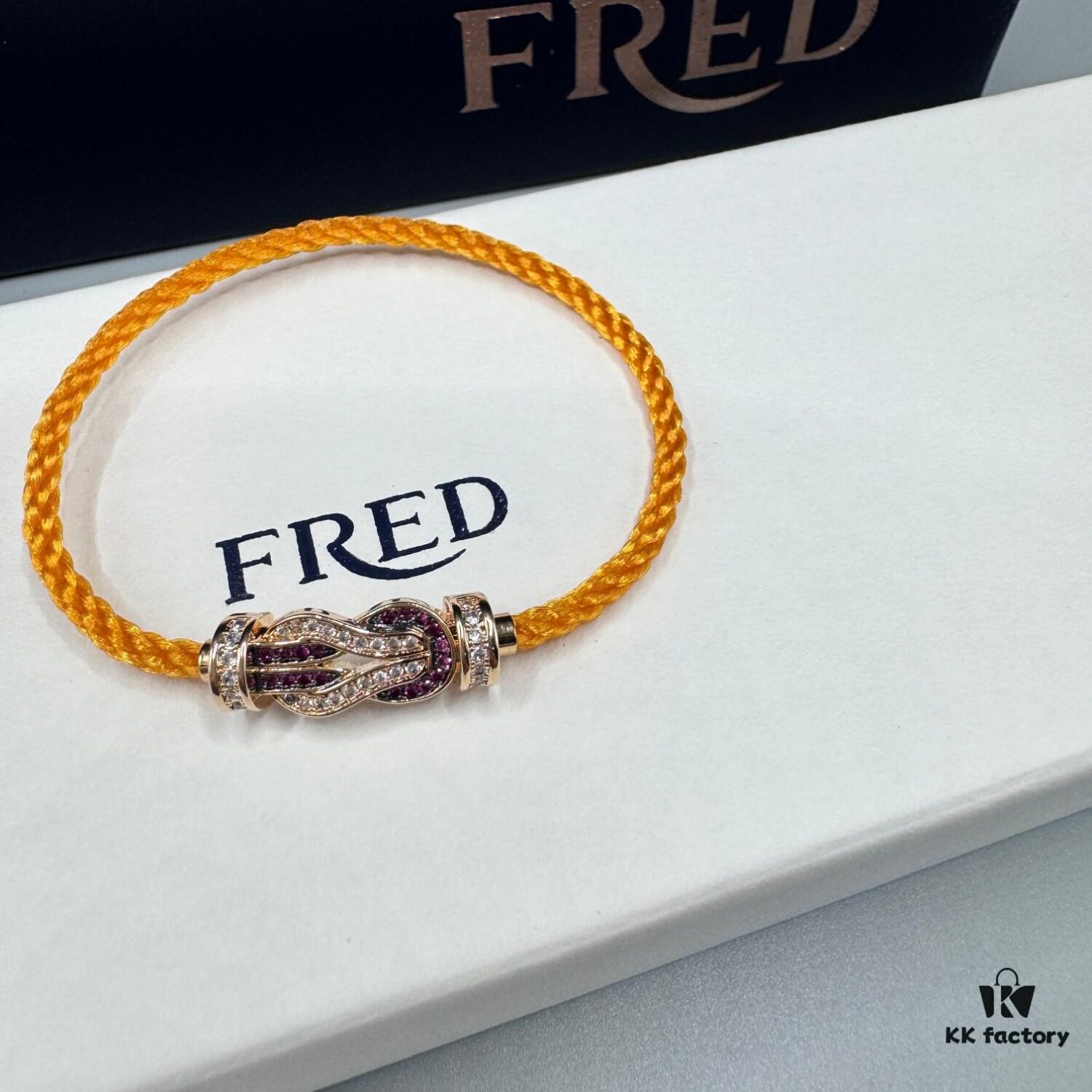 FRED Force 10 Bracelet in Rose Gold, Medium Size with Ruby Cabochon and Stainless Steel Cord