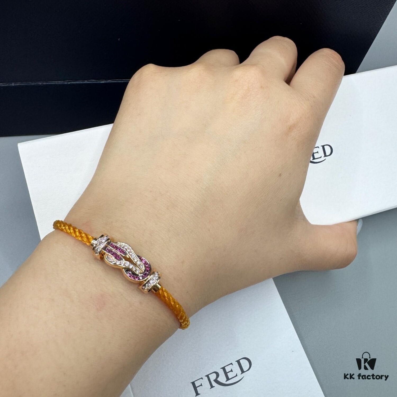 FRED Force 10 Bracelet in Rose Gold, Medium Size with Ruby Cabochon and Stainless Steel Cord