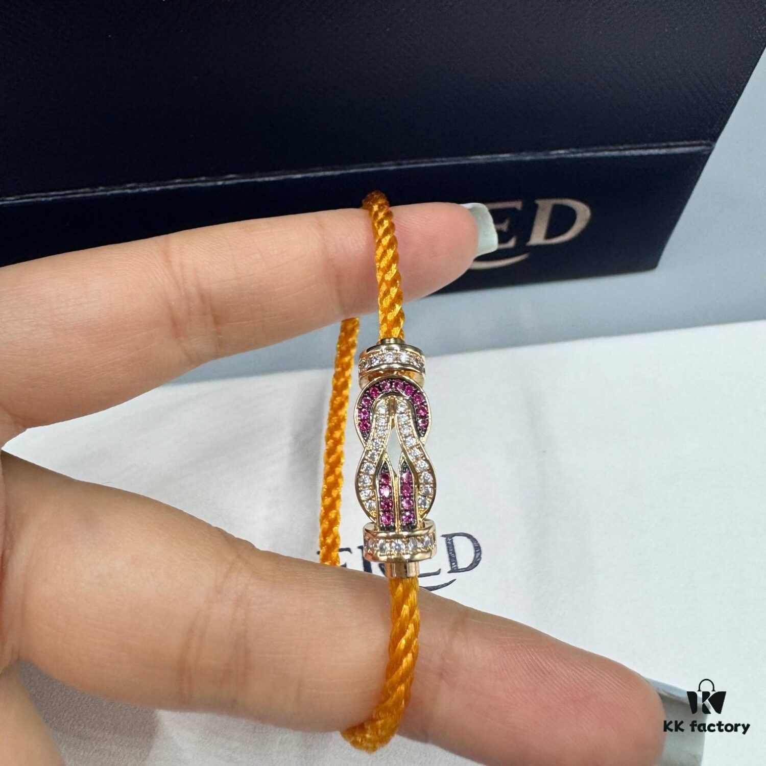 FRED Force 10 Bracelet in Rose Gold, Medium Size with Ruby Cabochon and Stainless Steel Cord