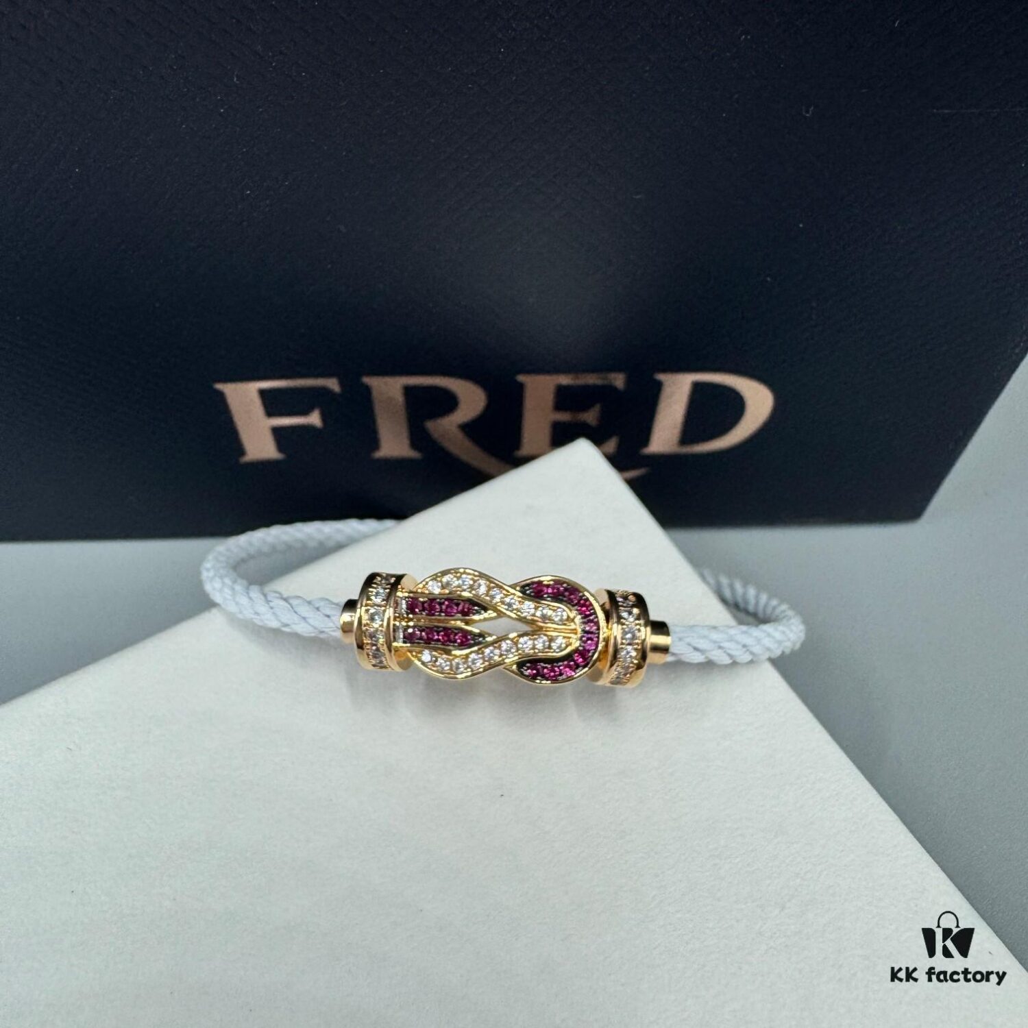 FRED Force 10 Bracelet in Rose Gold with Ruby, Medium Size, Stainless Steel Cord
