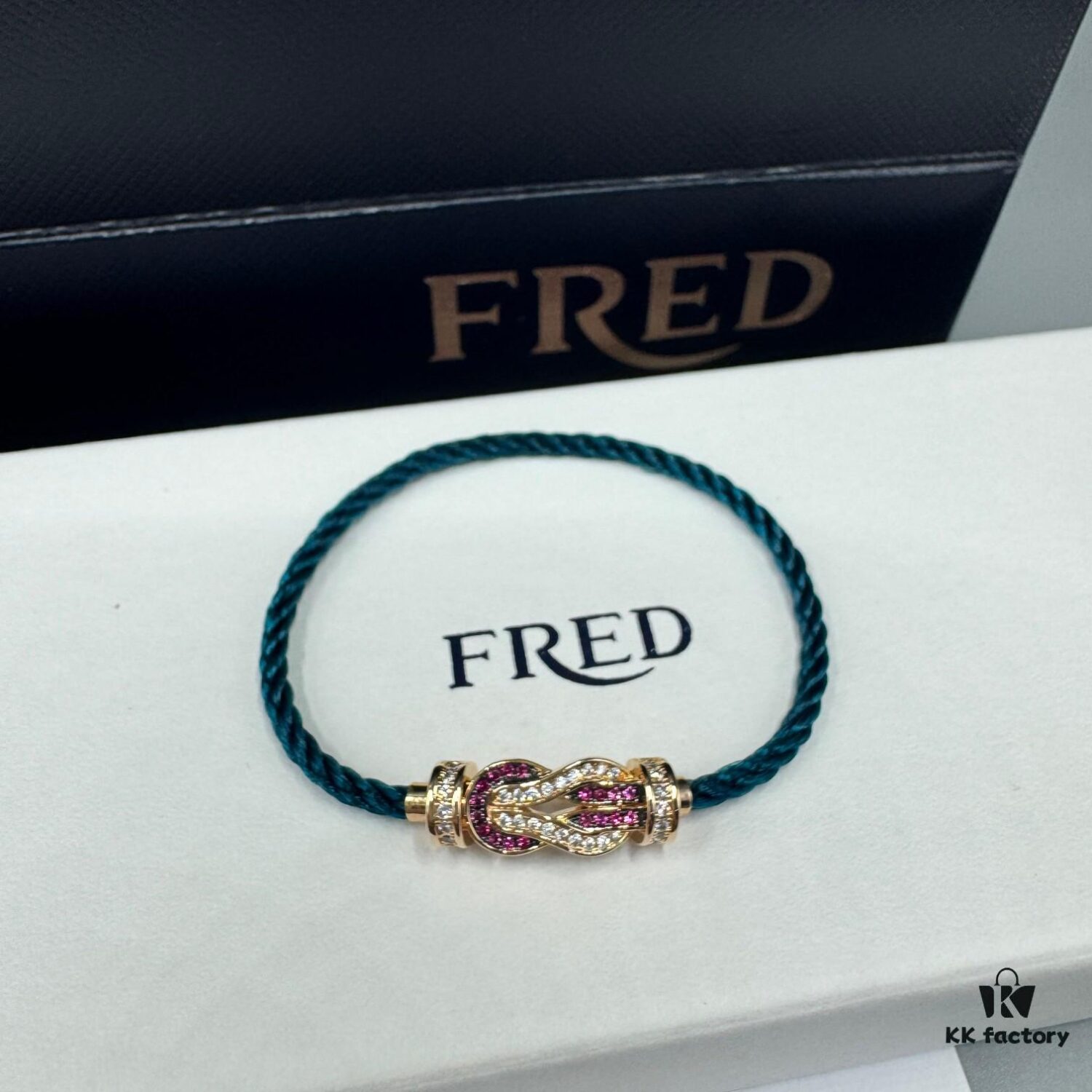 FRED Force 10 Bracelet in Rose Gold with Ruby, Medium Size, Red Gemstone Slide Buckle, Steel Cable Design