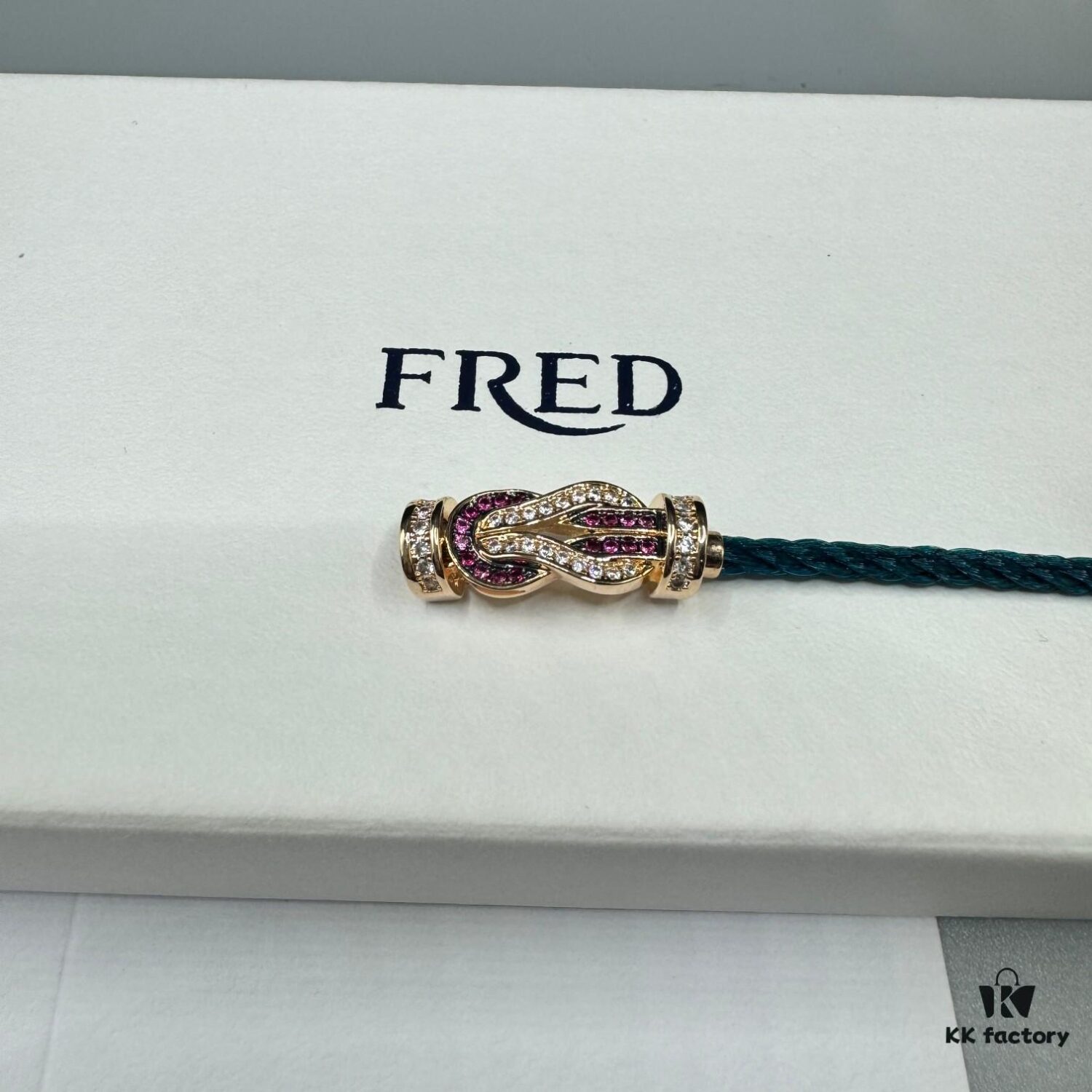 FRED Force 10 Bracelet in Rose Gold with Ruby, Medium Size, Red Gemstone Slide Buckle, Steel Cable Design
