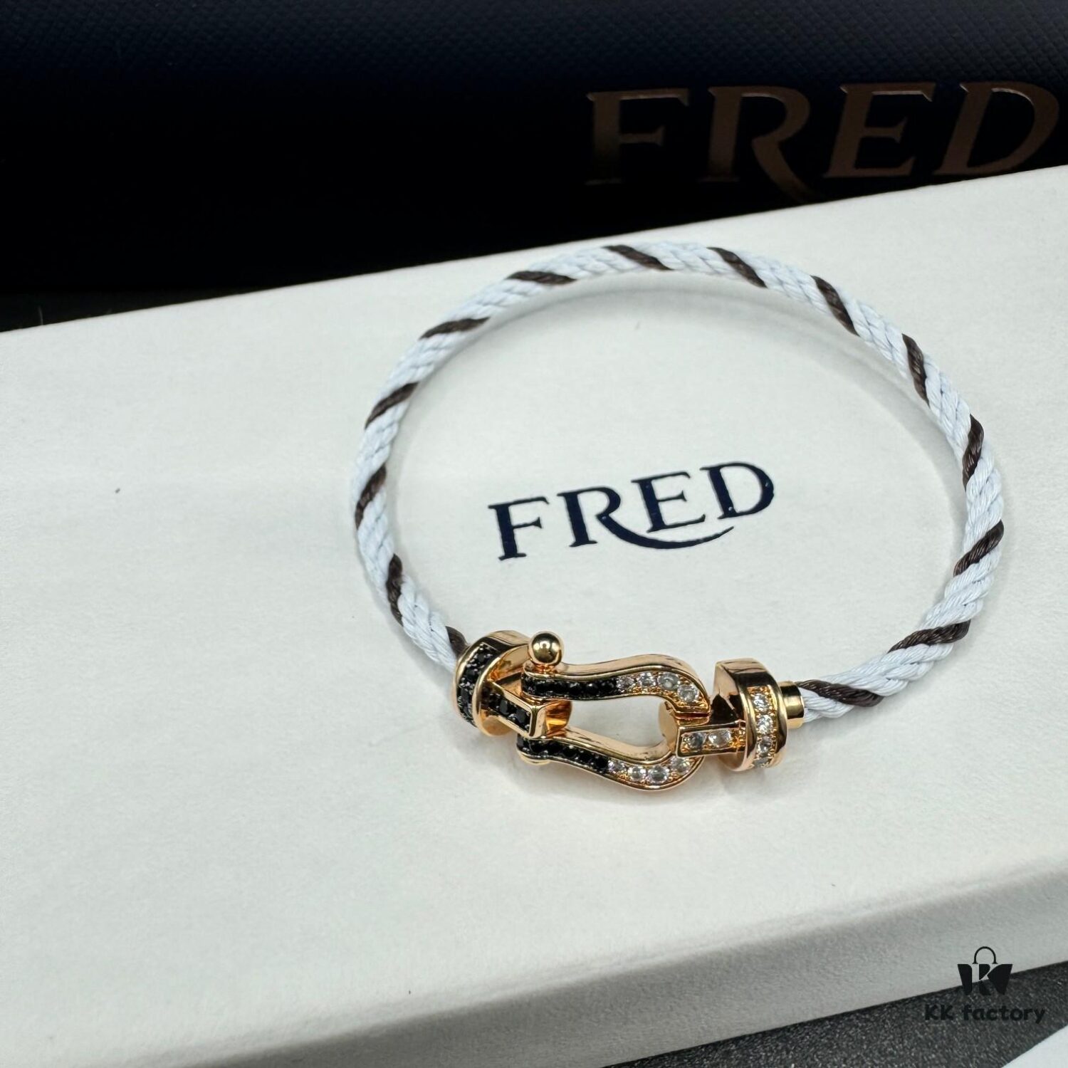 FRED Force 10 Bracelet in Rose Gold, Medium Size with Black and White Gemstones, Steel Cord Design