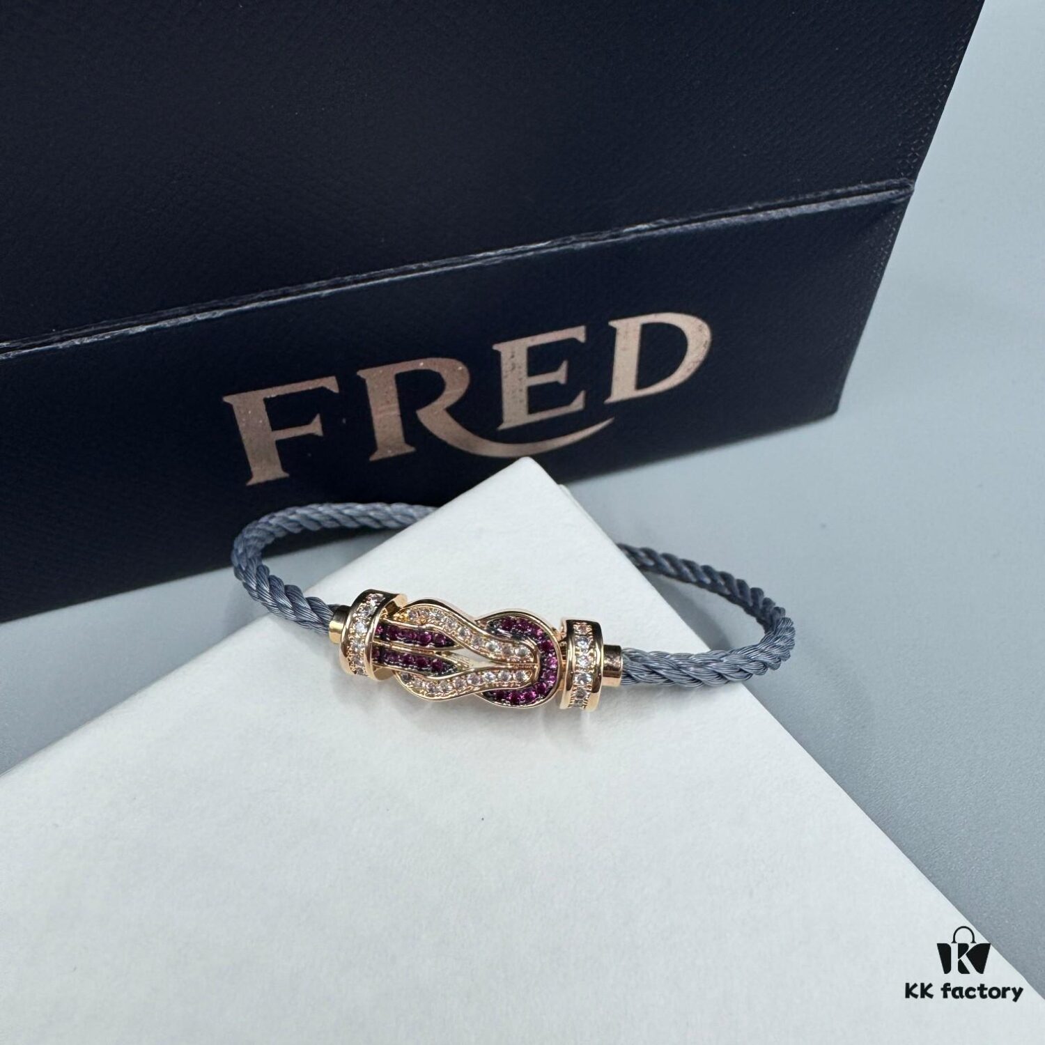 FRED Force 10 Bracelet in Rose Gold with Ruby, Medium Size, Red Sapphire Cabochon, Steel Cable Design
