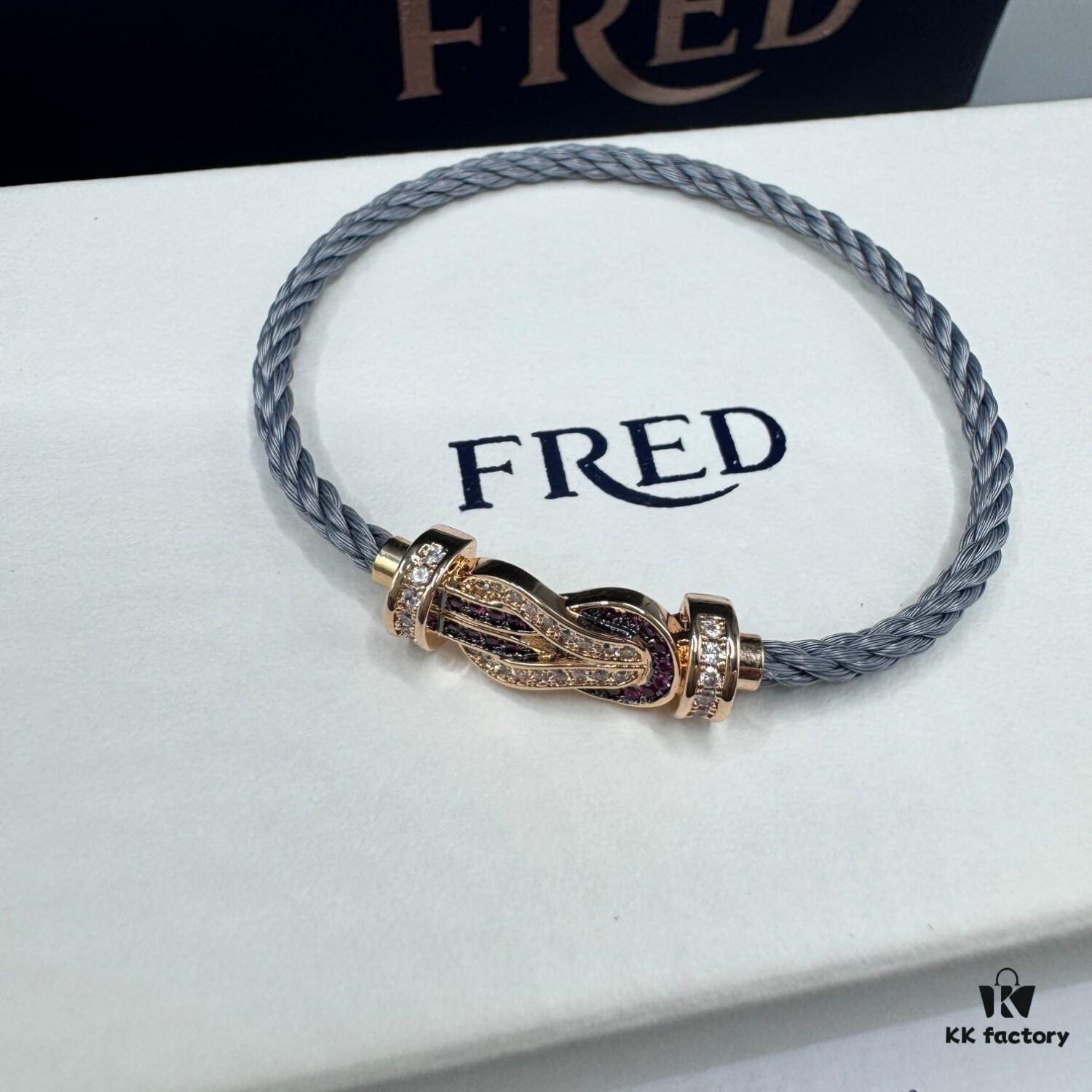 FRED Force 10 Bracelet in Rose Gold with Ruby, Medium Size, Red Sapphire Cabochon, Steel Cable Design