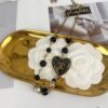 Xiaoxiang New Arrival Vintage Gold Black Heart Resin Fine Glitter Pearl Rhinestone Necklace