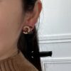 Xiaoxiang New Arrival Enamel Black and Gold Two-Tone Double C Stud Earrings Minimalist ✨✨