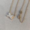 Cross Necklace in Rose Gold with White Shell, Chu Shang Mei Paris, Palladium Plated + 0.5 Version, 37.5-41.5cm, Full V-Gold with Natural Deep-Sea White Shell, Individually Carved Stone Setting, Center Inlaid with Premium Silicon Titanium Material