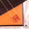 Hermès Enamel Curved H Necklace in Gold Tones