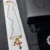 Kuroki Must-Have for Streetwear Enthusiasts: Colorful Diamond-Paved Brooch Cross Necklace, Pink Diamond Front and Smooth Back, Reversible and Detachable Design