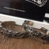 Chrome Hearts Wide Open Bangle Bracelet with Vintage Gothic Cross Design