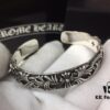 Chrome Hearts Wide Open Bangle Bracelet with Vintage Gothic Cross Design
