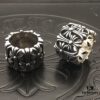 High-Version Chrome Hearts Round Grave Ring, Redefining Chrome Hearts Quality Compared to Thin and Flat Counterfeit Versions on the Market. Features Handwritten Engraving on Inner Band, Asymmetrical Cross Design with Elegant Curves and Distinct Layers. Sizes 5-11