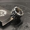 High-Version Chrome Hearts Round Grave Ring, Redefining Chrome Hearts Quality Compared to Thin and Flat Counterfeit Versions on the Market. Features Handwritten Engraving on Inner Band, Asymmetrical Cross Design with Elegant Curves and Distinct Layers. Sizes 5-11
