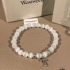 Chrome Hearts Cat's Eye Bracelet & Vivienne Westwood Bow Galaxy Bracelet