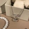 Chrome Hearts Cat's Eye Bracelet & Vivienne Westwood Bow Galaxy Bracelet